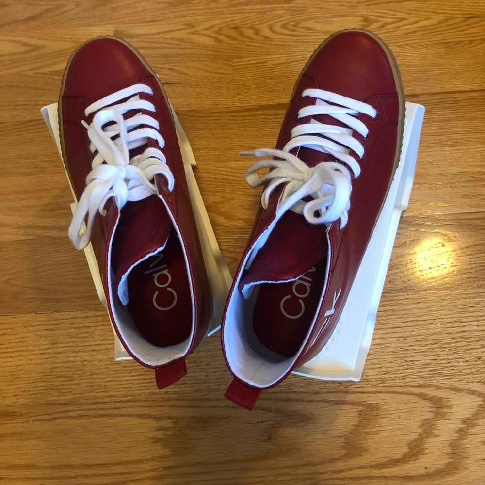 Red Calvin Klein monogram logo  high tops